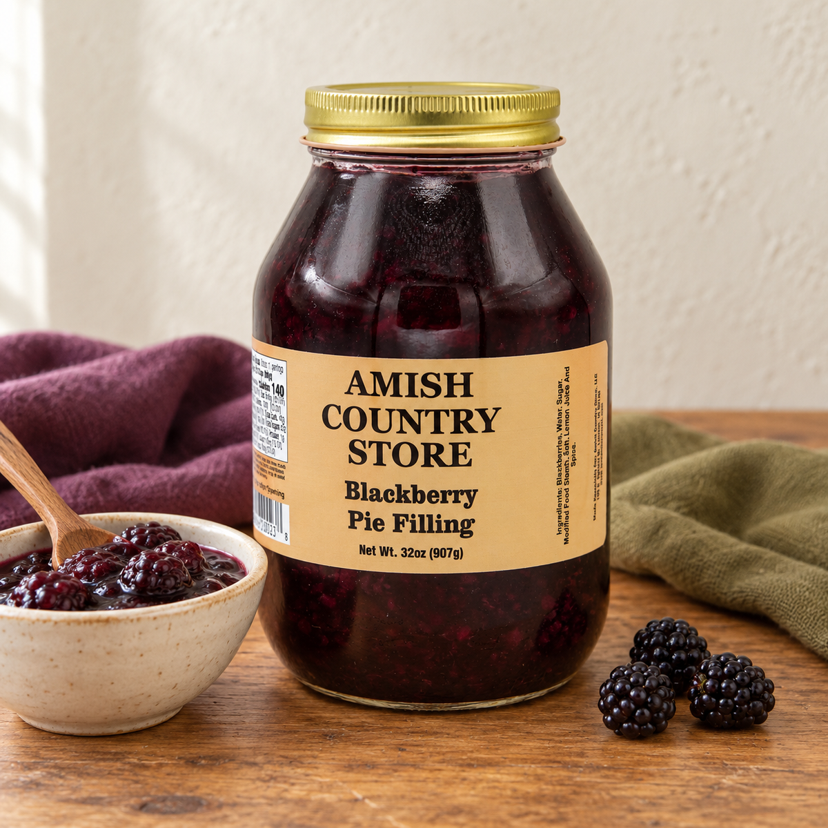 Blackberry Pie Filling, 32 oz (907g), beside a small serving and fruit