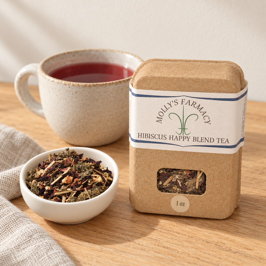 Molly's Farmacy Hibiscus Happy Blend Tea, 1 oz, beside loose tea and a cup. Styled scene based on the genuine product photo.
