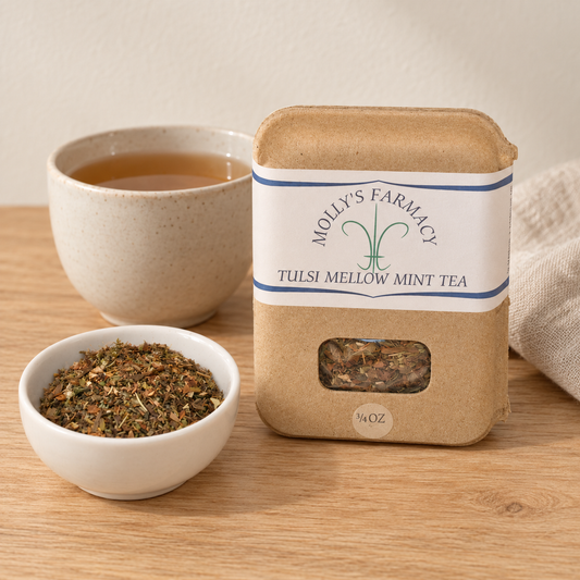 Molly's Farmacy Tulsi Mellow Mint Tea, 3/4 oz, beside loose tea and a cup. Styled scene based on the genuine product photo.
