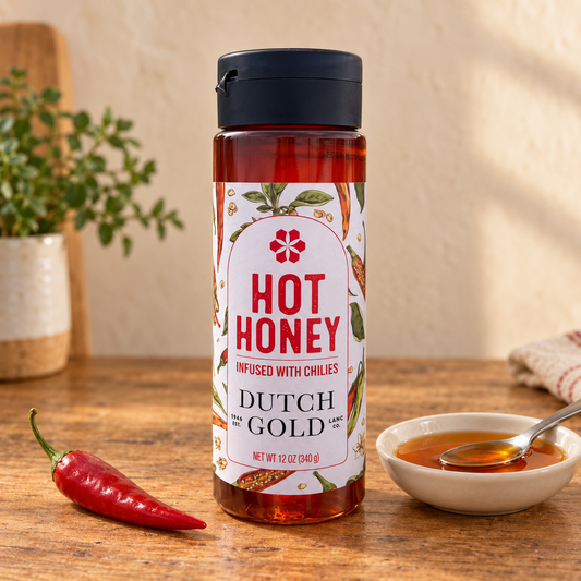 Dutch Gold Hot Honey – Sweet Heat for Every Bite; 12 oz package shown beside a serving.