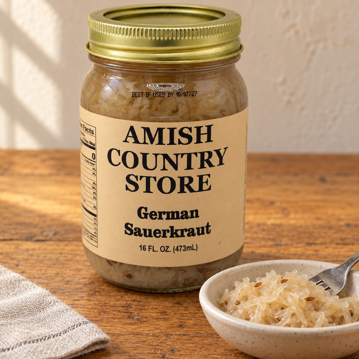 Old-Fashioned German Sauerkraut jar beside a serving of its contents.