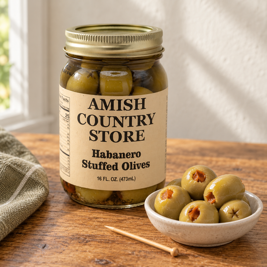 Amish Country Store Habanero Stuffed Olives, 16 fl oz jar, with green olives filled with habanero pepper pieces.