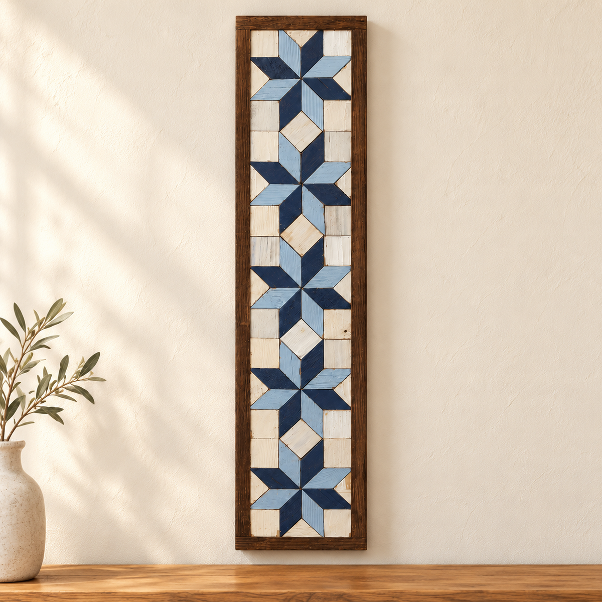6 × 25.5-inch five-star barn quilt S2, blue and white displayed against an ivory wall with warm wood styling.
