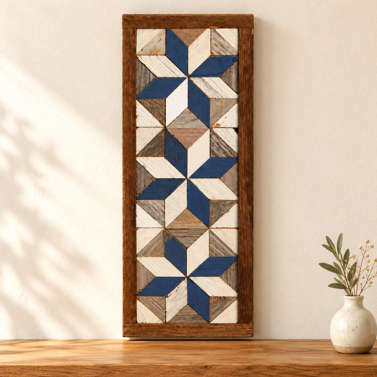 15.5 × 6-inch three-star barn quilt S2, blue and white displayed against an ivory wall with warm wood styling.