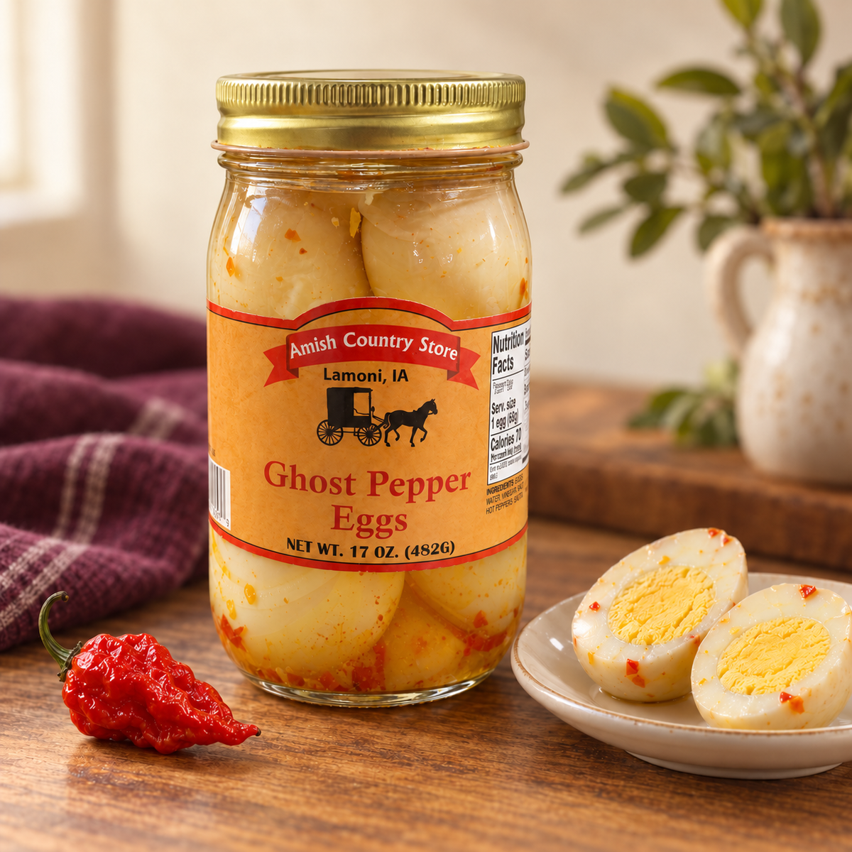 Ghost Pepper Pickled Eggs | 17 oz in its original jar with a serving suggestion.