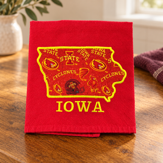 Red Iowa State University dish towel with Iowa-shaped appliqué and yellow embroidery.