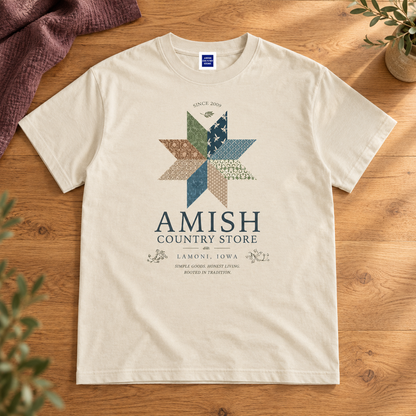 Front of the vintage cream Quilt Star T-shirt with blue, green and brown patchwork print.