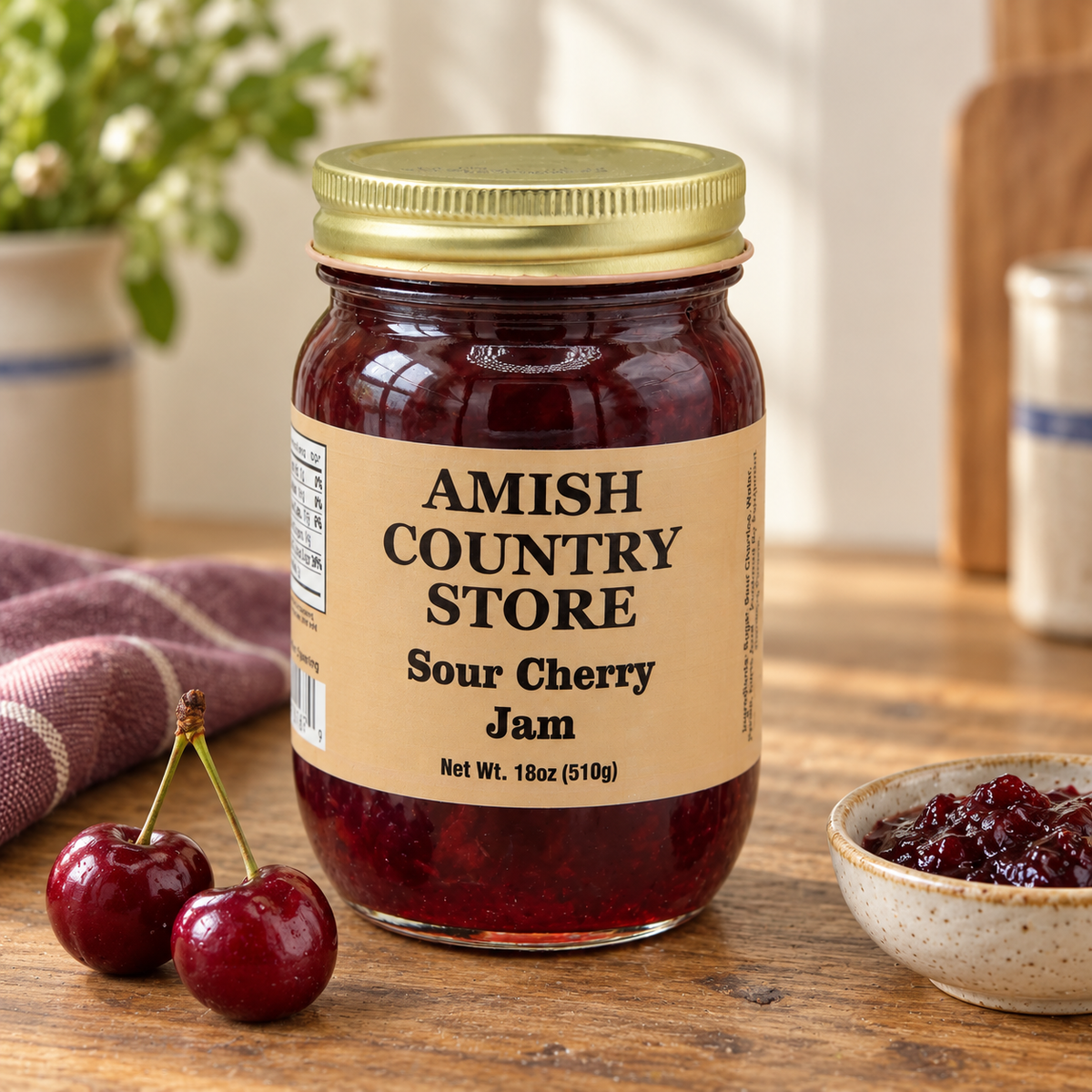 Amish Country Store Sour Cherry Jam 18oz (510g) jar with its prepared contents on warm wood.