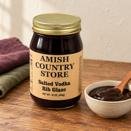 Amish Country Store Salted Vodka Rib Glaze, 16 oz jar beside a serving of sauce