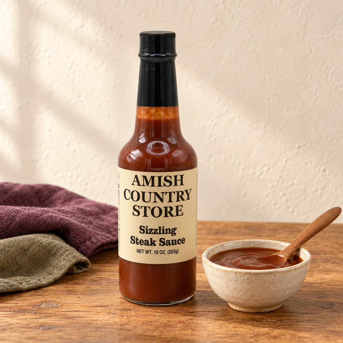 Sizzling Steak Sauce, 10 oz (283g) beside a serving of sauce
