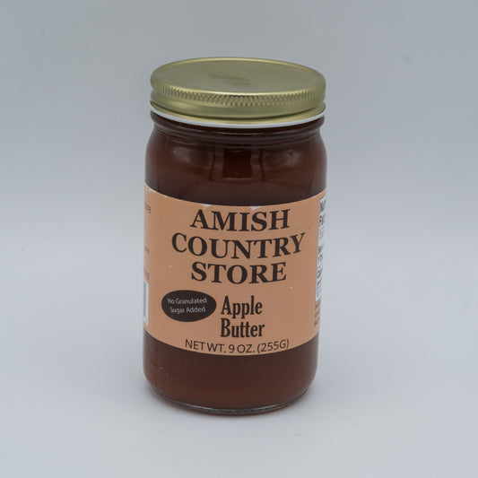 Jar of Amish Country Store Apple Butter on a gray background