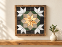S1145 — small wooden barn quilt wall art, natural wood center star, green ring and white corner stars on charcoal, displayed on an indoor wall in a styled home