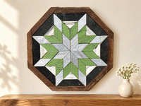 S1153 — small wooden barn quilt wall art, octagonal with silver center star, light green ring and silver tips, displayed on an indoor wall in a styled home