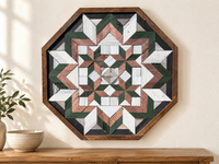 S1194 — wooden barn quilt wall art, OCTAGONAL eight-sided quilt with forest green, dusty rose, charcoal, white and gray geometric flower and four small inner stars, shown on an indoor wall in a styled home display