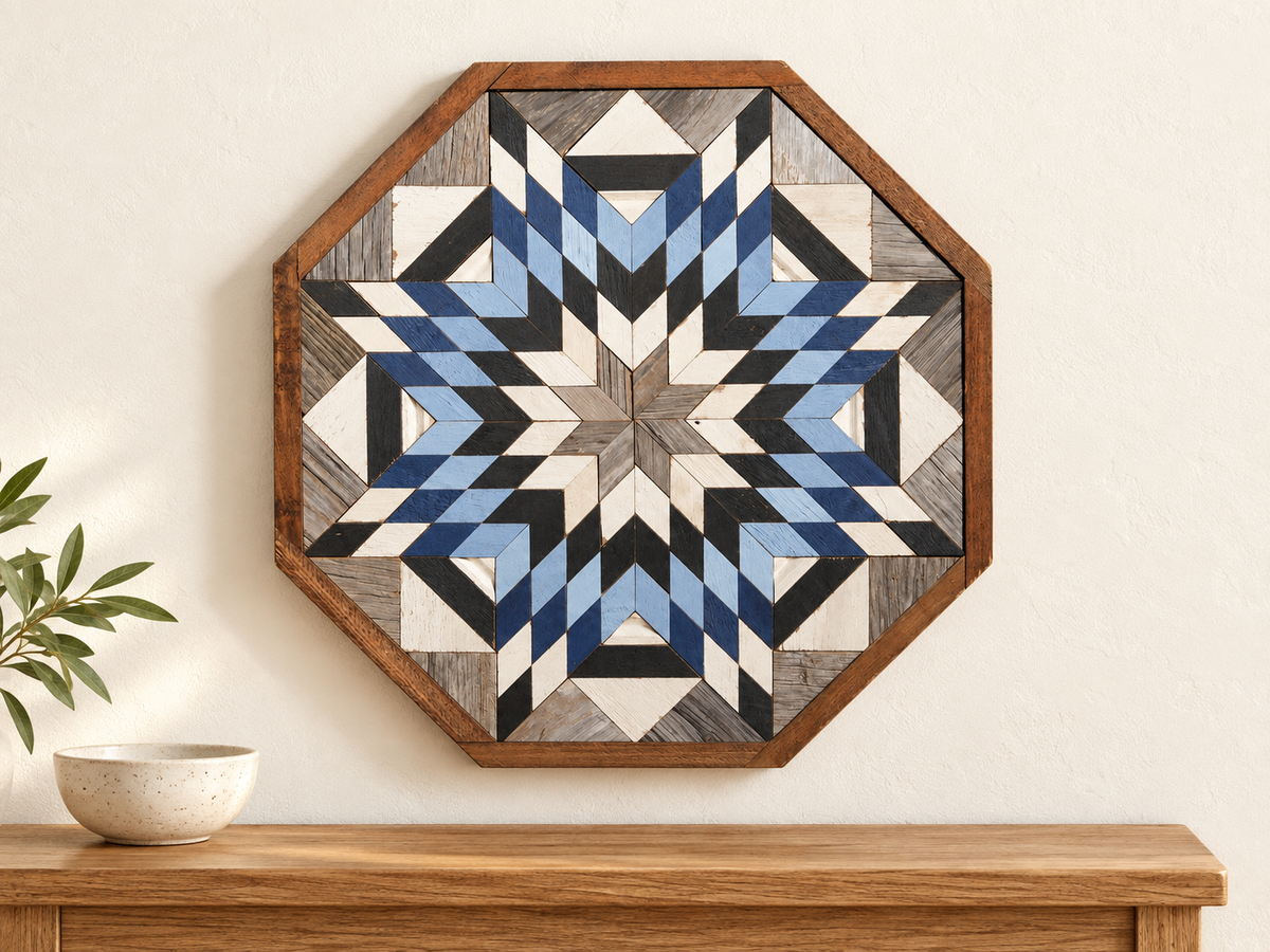 S1211 — wooden barn quilt wall art, OCTAGONAL navy, light blue, white and charcoal starburst, shown on an indoor wall in a styled home display