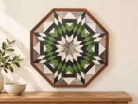 S1212 — wooden barn quilt wall art, OCTAGONAL forest green, light green, white and charcoal starburst, shown on an indoor wall in a styled home display