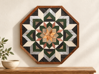 S1219 — wooden barn quilt wall art, octagonal forest green, ivory and silver flower with natural wood center, displayed on an indoor wall in a styled home