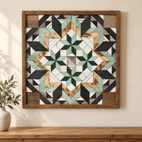 S1232 — Amish reclaimed wood barn quilt wall art, square mint-green and forest-green four inner stars with charcoal, honey wood, white and gray geometric flower, displayed on an indoor wall above an oak console