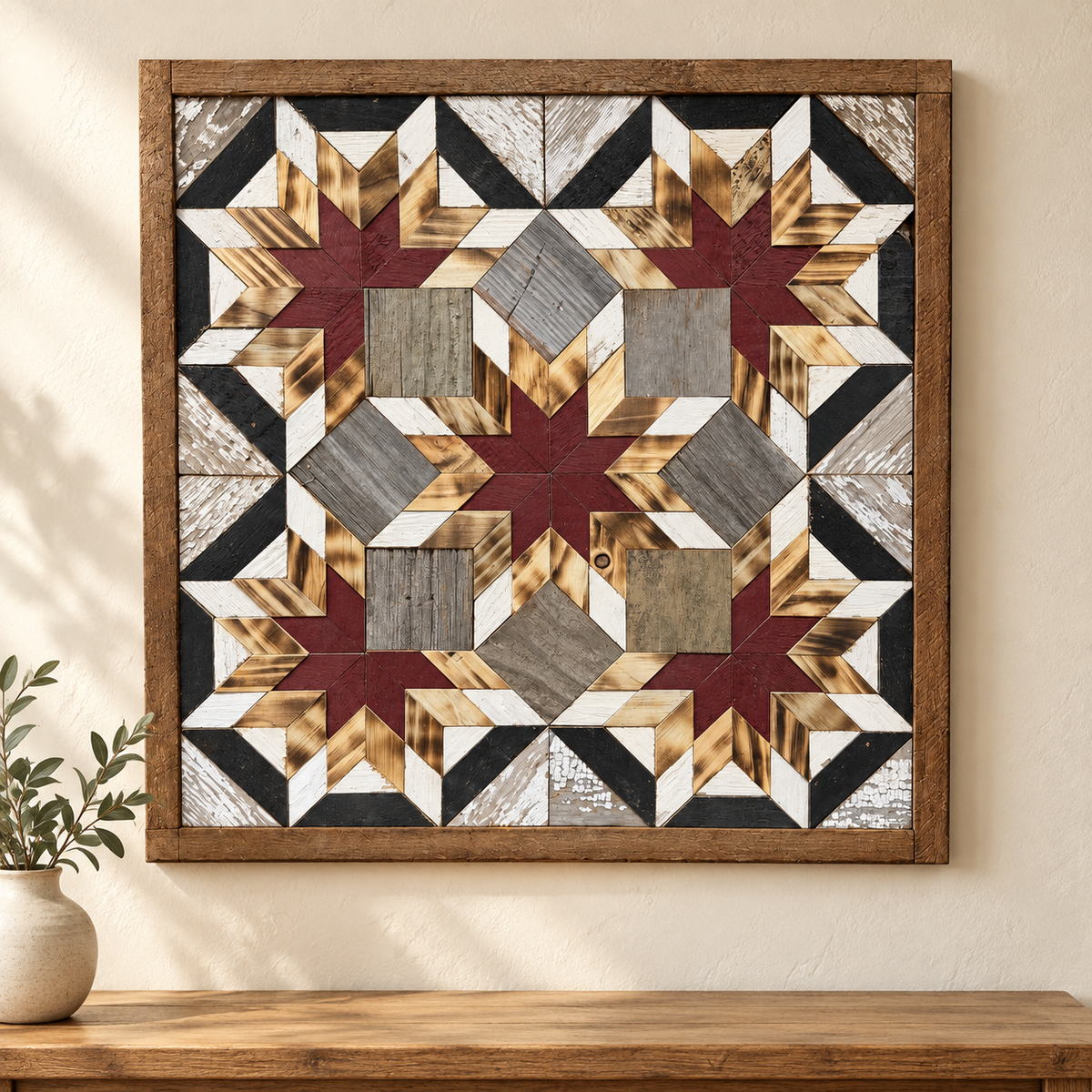 S1239 — Amish reclaimed wood barn quilt wall art, square five burgundy and honey wood stars with white, charcoal and weathered gray blocks, displayed on an indoor wall above an oak console