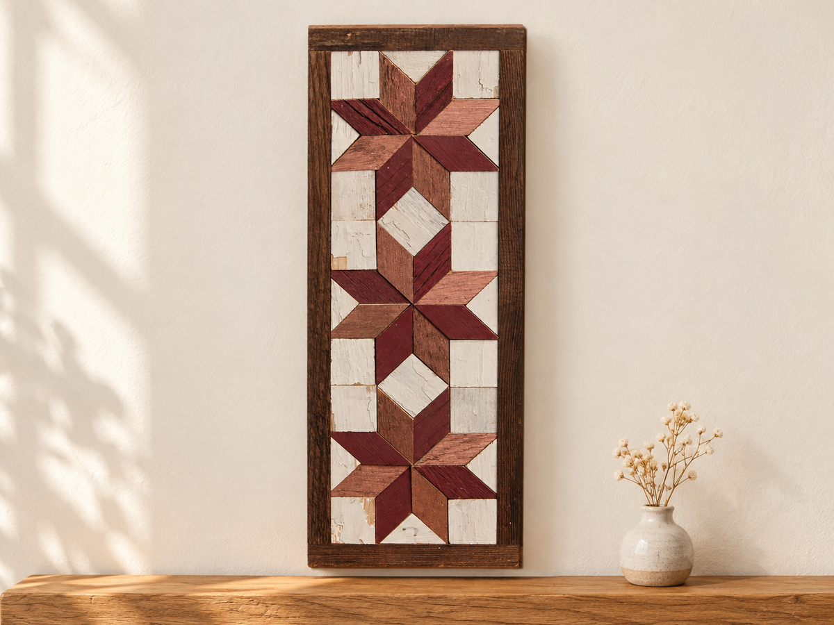 S10 — horizontal three-star wooden barn quilt wall art, three burgundy and copper rose stars on ivory squares, displayed on an indoor wall in a styled home
