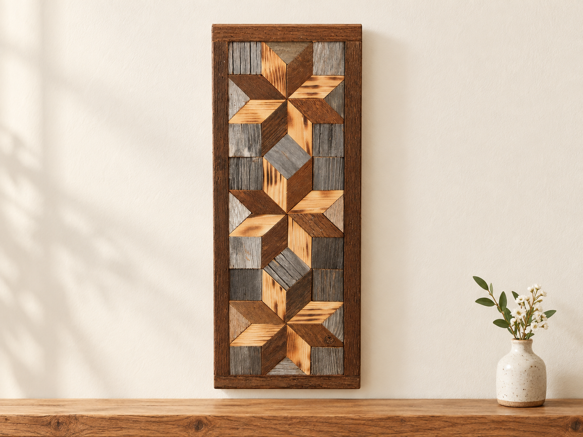 S11 — horizontal three-star wooden barn quilt wall art, three honey wood and brown stars on weathered gray squares, displayed on an indoor wall in a styled home