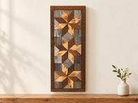 S11 — horizontal three-star wooden barn quilt wall art, three honey wood and brown stars on weathered gray squares, displayed on an indoor wall in a styled home