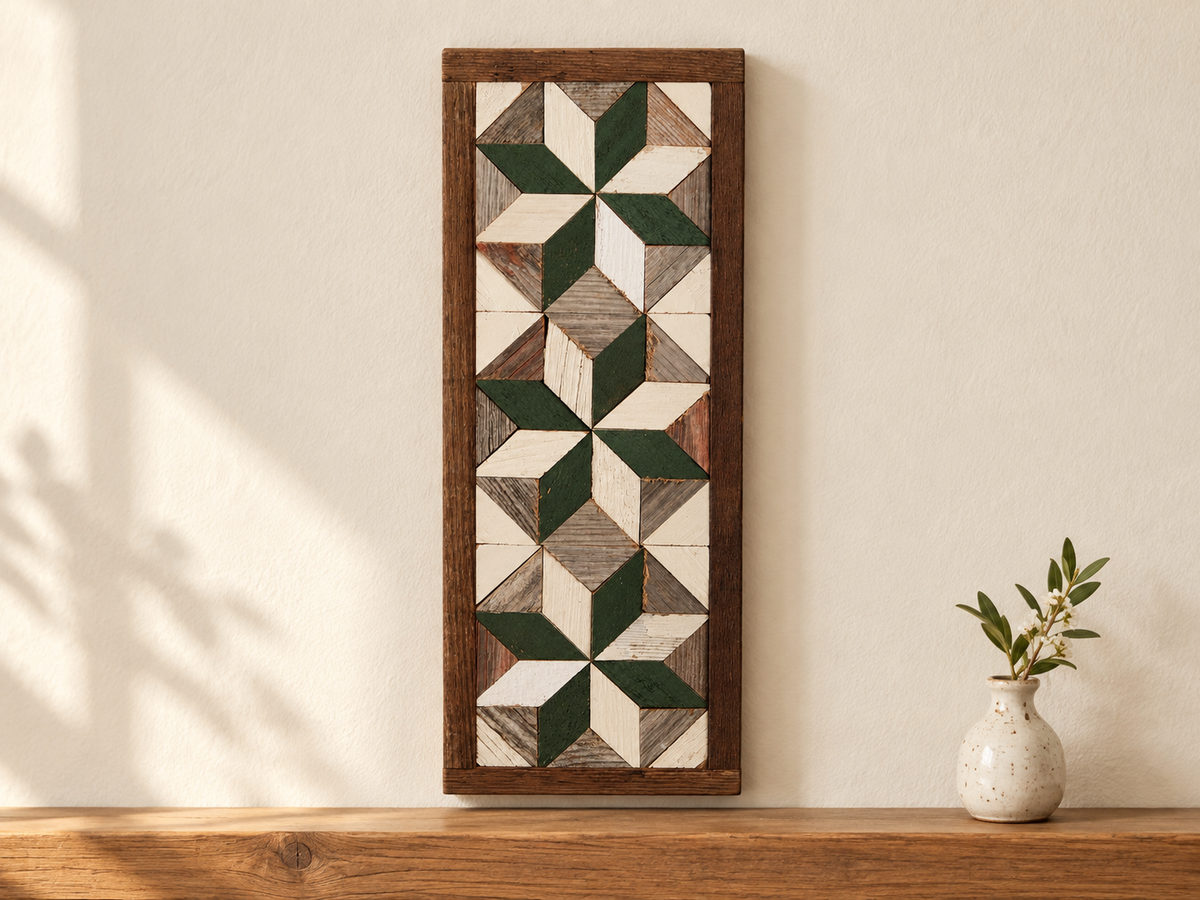 S13 — horizontal three-star wooden barn quilt wall art, three forest green and ivory stars on weathered white and gray triangles, displayed on an indoor wall in a styled home
