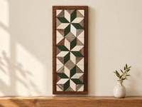 S13 — horizontal three-star wooden barn quilt wall art, three forest green and ivory stars on weathered white and gray triangles, displayed on an indoor wall in a styled home