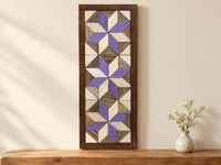 S18 — horizontal three-star wooden barn quilt wall art, three lavender and ivory stars on weathered white and gray triangles, displayed on an indoor wall in a styled home