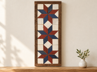 S6 — horizontal three-star wooden barn quilt wall art, three navy and brick red stars on ivory squares, displayed on an indoor wall in a styled home