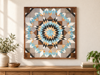 S1188 — 30.5 inch Amish reclaimed wood barn quilt, pale turquoise blue, black, gray, white and natural wood geometric starburst flower, displayed on an entryway wall above an oak console