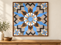 S1194 — wooden barn quilt wall art, bright blue, gray, charcoal and natural wood geometric flower with four blue-and-wood corner stars, shown on an indoor wall in a styled home display