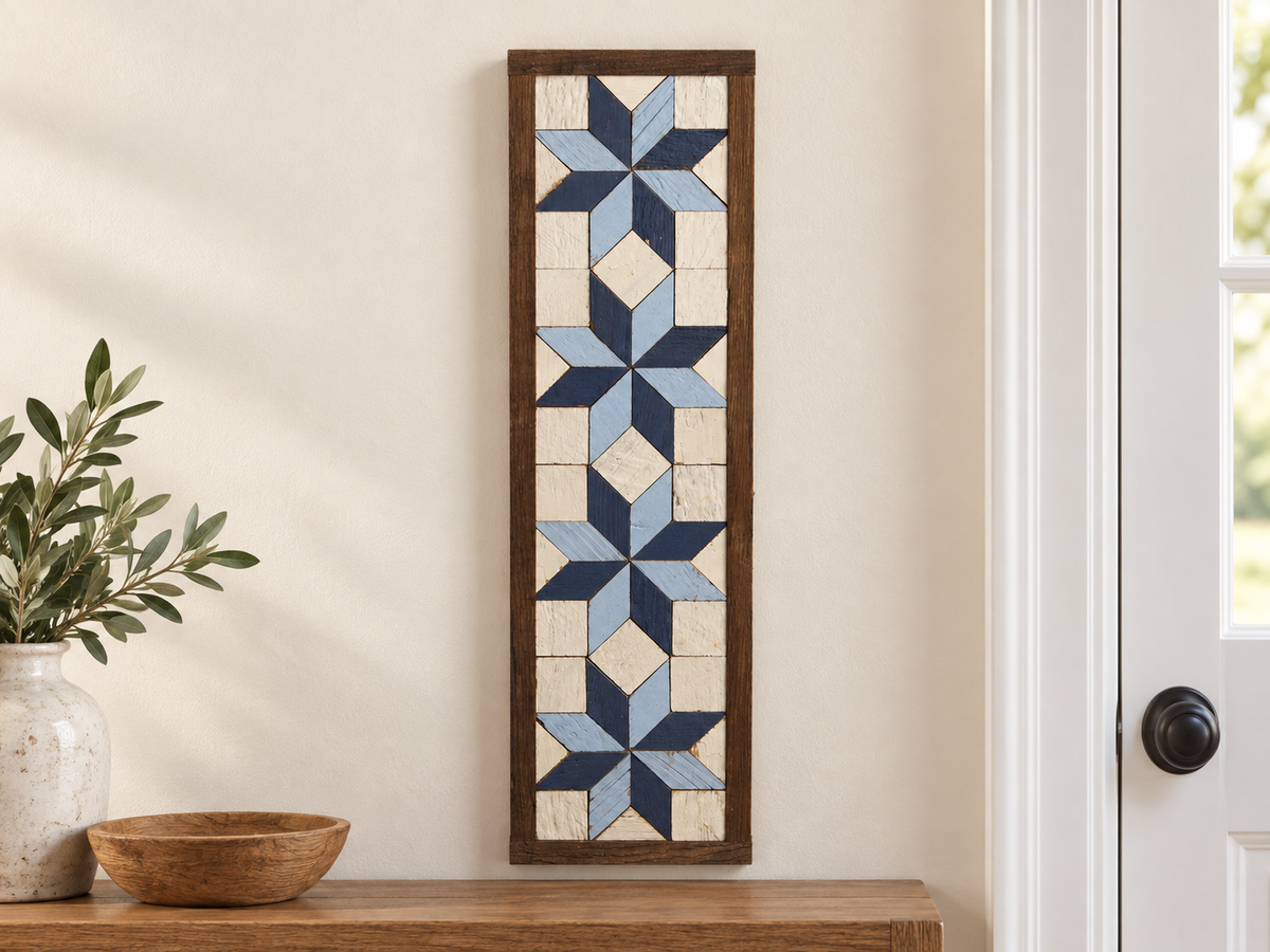 S15 — vertical four-star wooden barn quilt wall art, four navy and light-blue stars on ivory squares, displayed beside an entryway