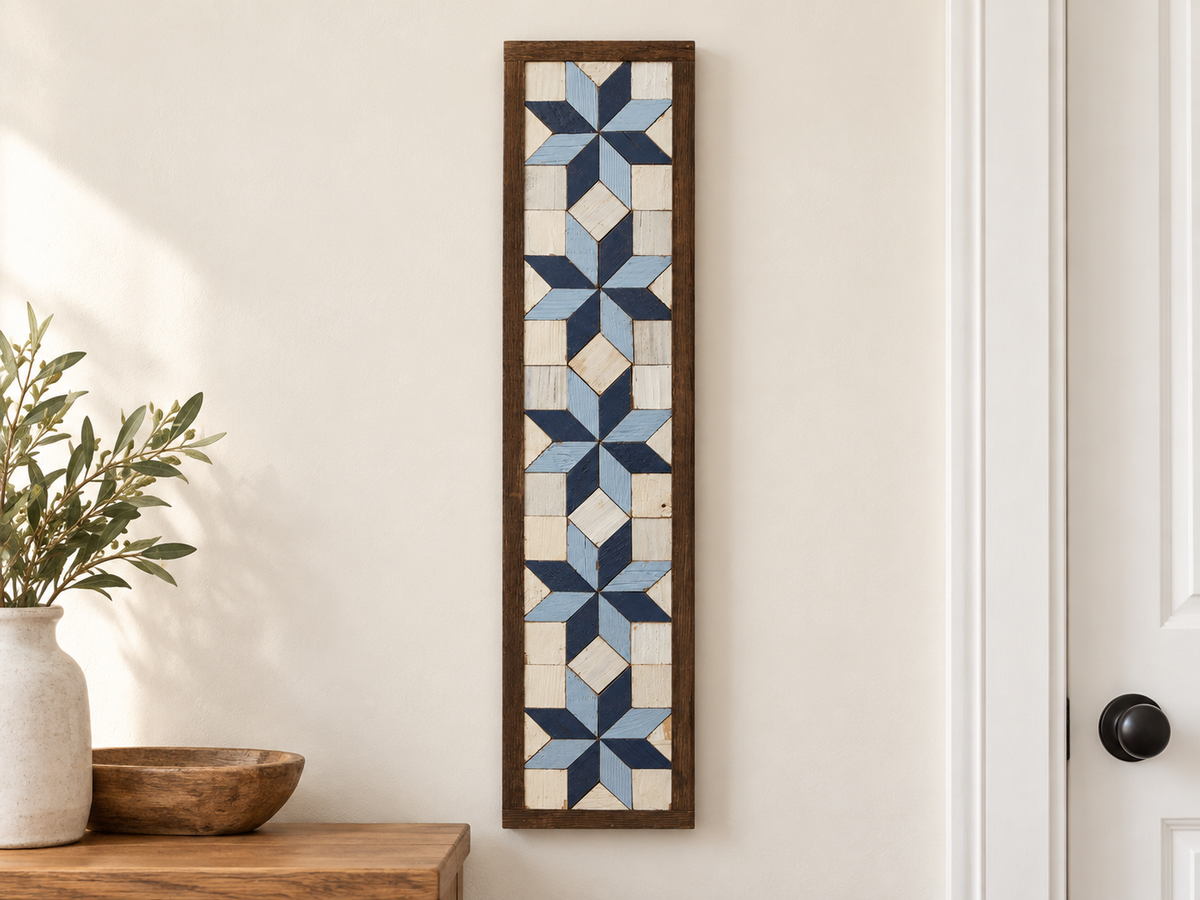 S2 — vertical five-star wooden barn quilt wall art, five pale-blue and navy stars on ivory squares, displayed beside an entryway
