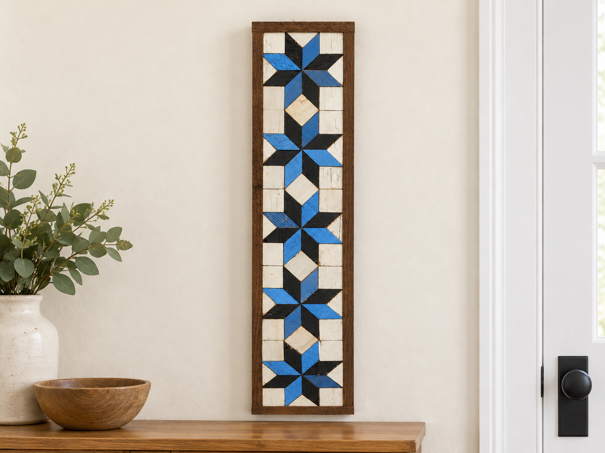 S3 — vertical five-star wooden barn quilt wall art, five blue and black stars on ivory squares, displayed beside an entryway