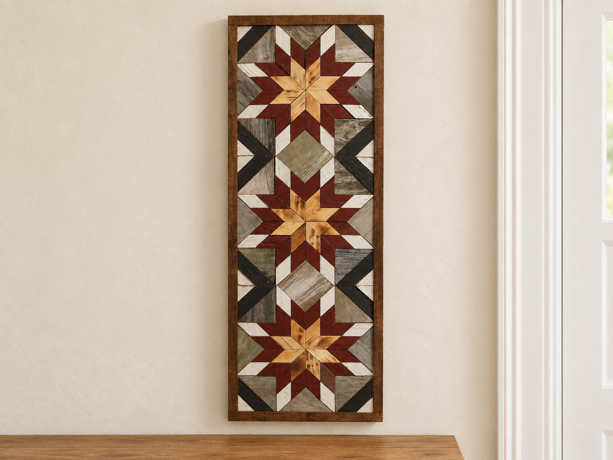 S1213 — tall wooden barn quilt banner wall art, three natural wood center stars, burgundy middle points, white tips, gray field and black corner diagonals, displayed on an indoor wall in a styled home