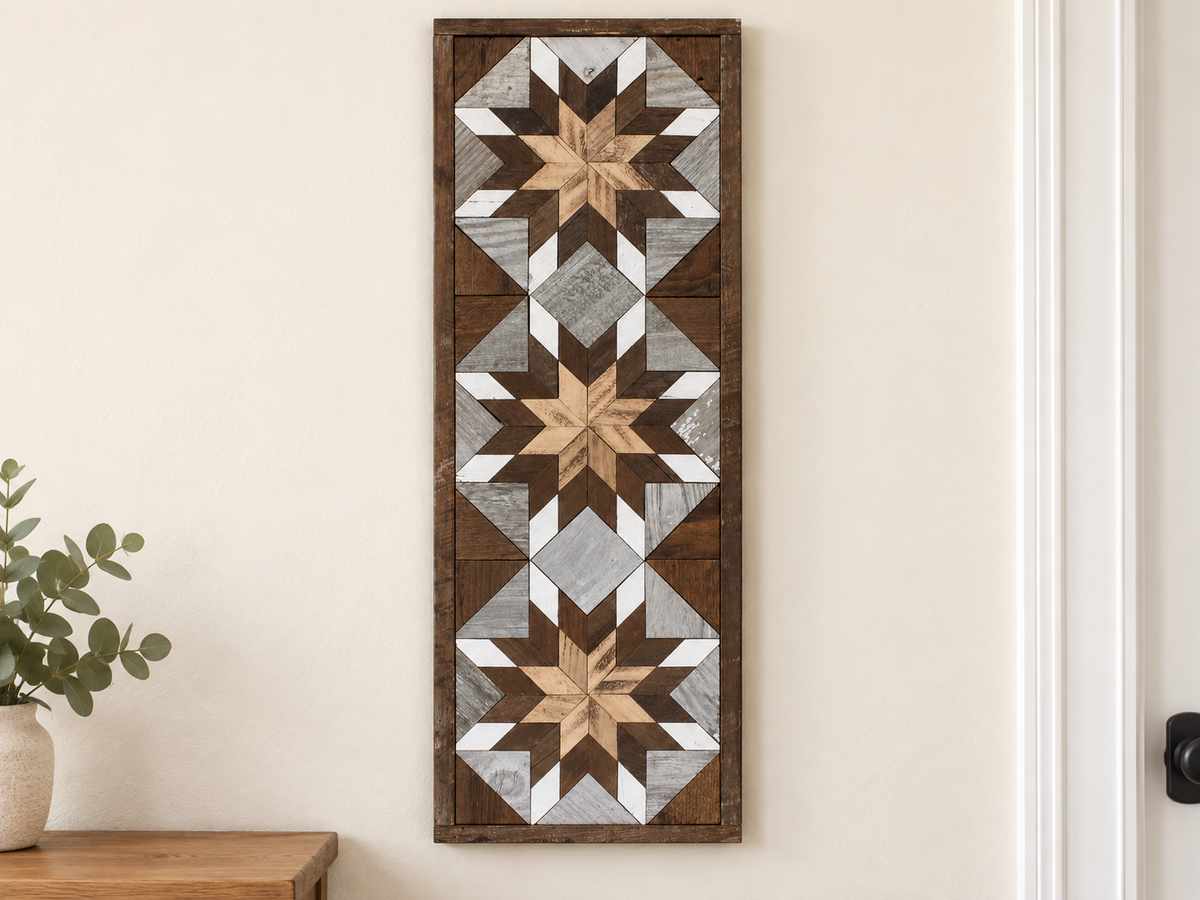 S719 — tall wooden barn quilt banner wall art, three stacked starbursts with natural wood centers, brown middles and white tips, displayed on an indoor wall in a styled home