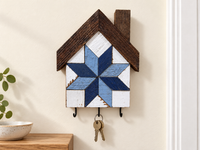 KH-10 — house-shaped wooden barn quilt key holder with exactly three existing metal hooks, KH-10 Navy & Blue, displayed beside an entryway