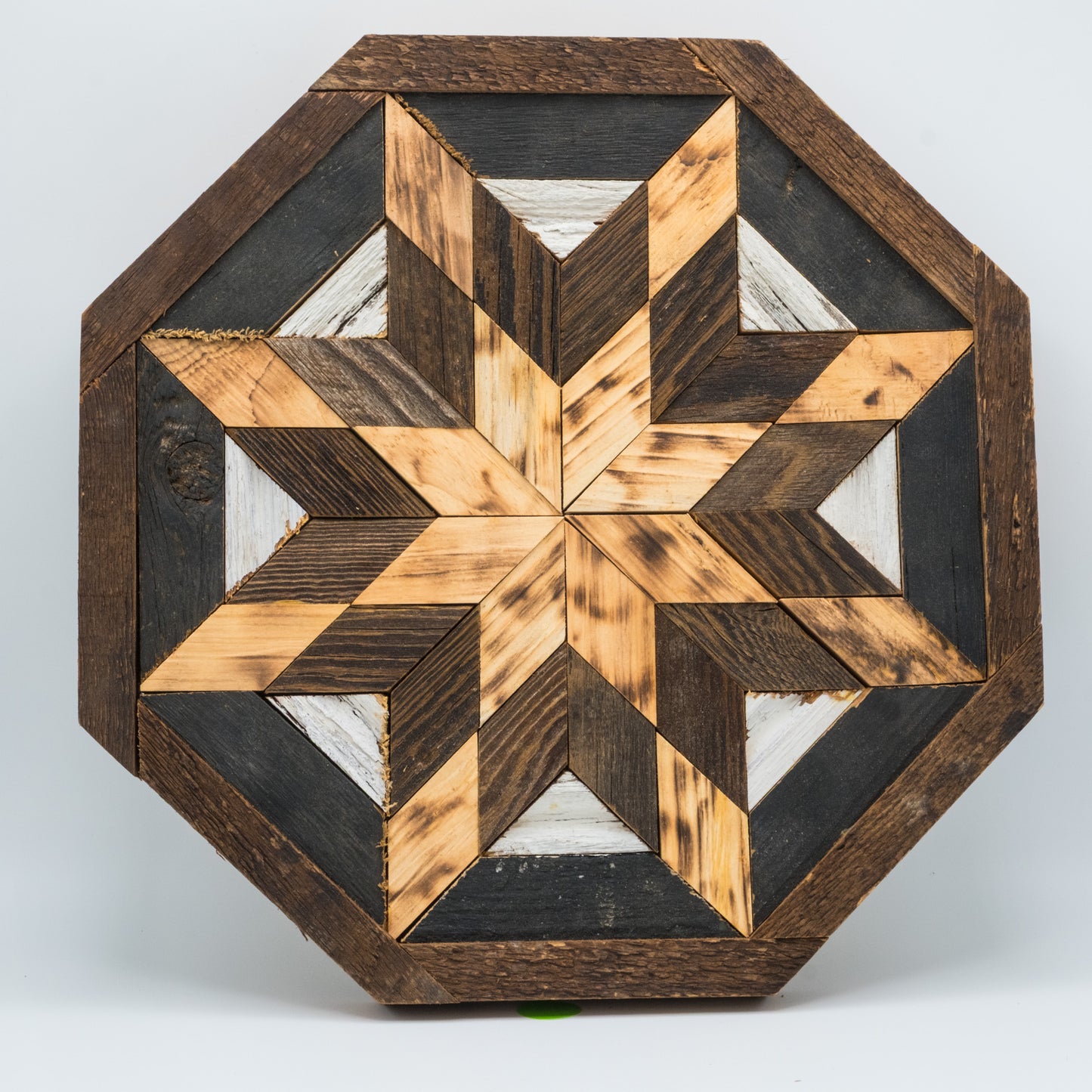 Wooden star-shaped puzzle on a white background