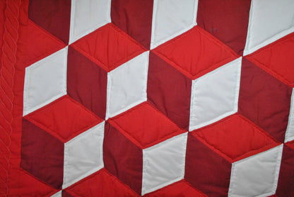 tumbling blocks with fire engine red as one side, dark red as the second side, and white as the third side